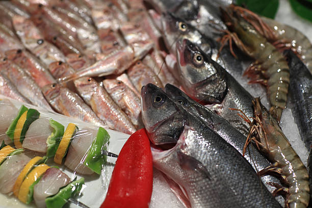istock View raw fishes on the counter 528362497