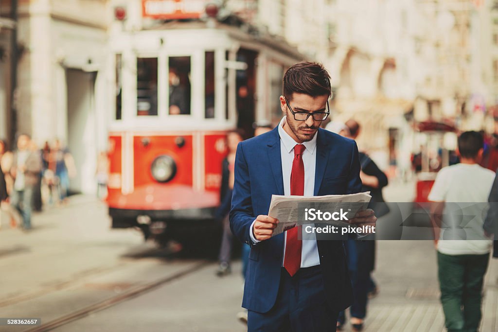 Businessman in Turkey with smart phone Shot made during Istockalypse Istanbul 2014 event. Businessman Stock Photo