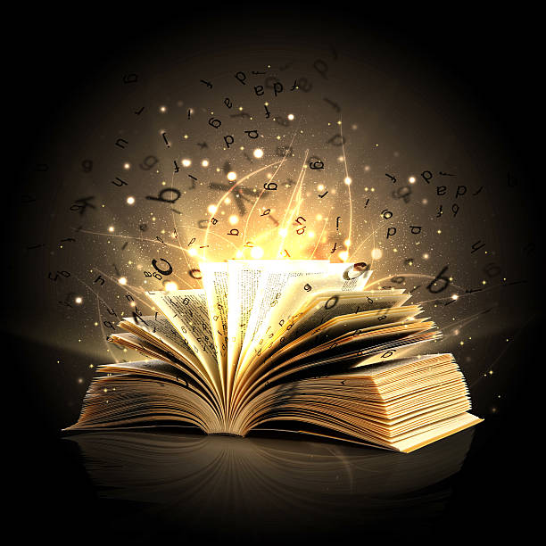 Magic book with magic lights and letters Opened magic book with blowing black letters bible art library stock pictures, royalty-free photos & images