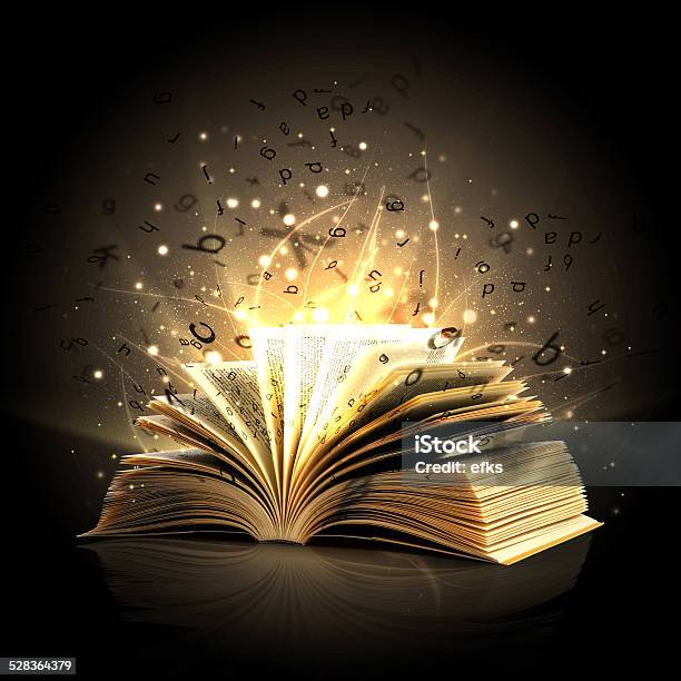 Magic Book With Magic Lights And Letters Stock Photo - Download Image Now - Book, Storytelling, Text