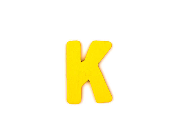 istock Colorful wooden alphabet letter on white background ,K 528371613