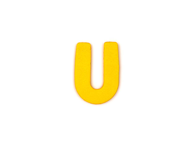 istock Colorful wooden alphabet letter on white background ,U 528371669