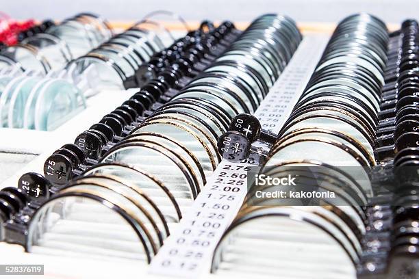 Optician With Many Different Trial Lenses Stock Photo - Download Image Now - Cultures, Diopter, Equipment