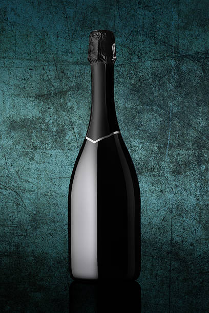 bottle of sparkling wine on colorful background