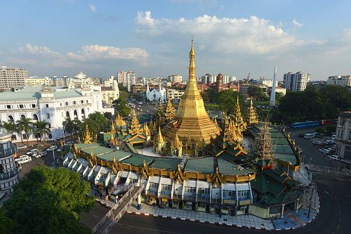 Yangon, Myanmar - December 11th 2014: The Sule Pagoda and central Yangon with national monument.