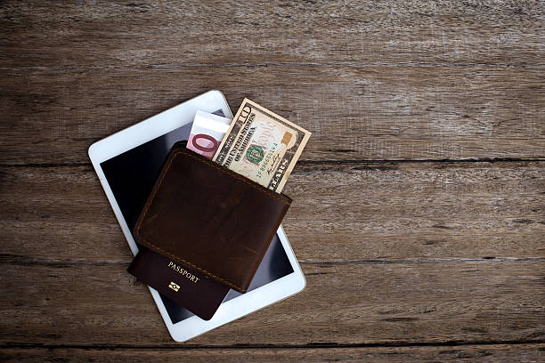 istock Passport with a note on a wooden table. 528378791