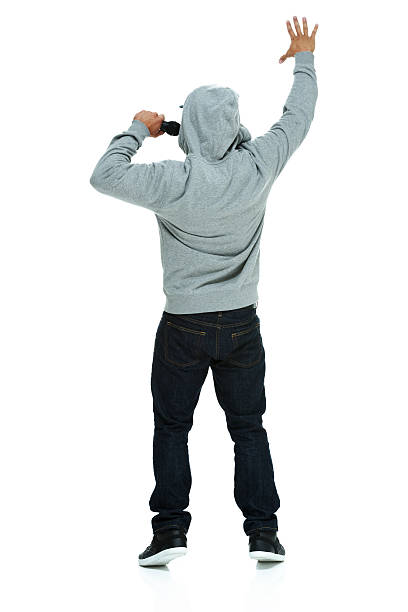 istock Rear view of rapper rapping with microphone 528379797