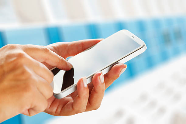 istock Touching the screen of a modern smart phone 528379867