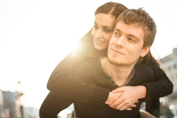 istock couple embracing togetherness at dusk 528387215