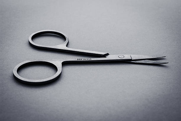 Nail Scissors on cold background stock photo