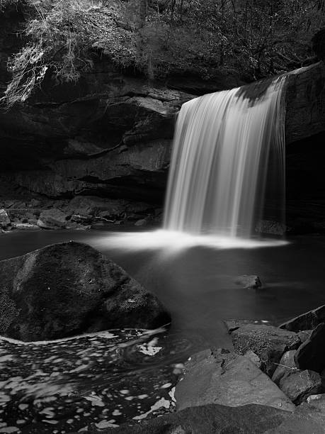 istock Waterfall in the woods Kentucky black and white 528393577