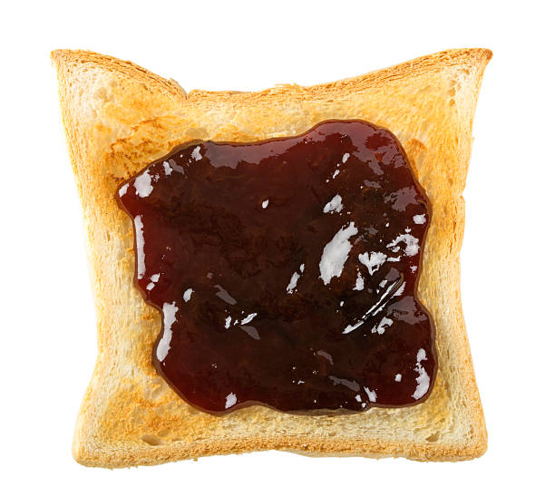 istock Toast with a red berry jam 528395059