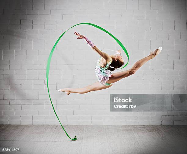 Girl Is Engaged In Art Gymnastics Stock Photo - Download Image Now - Activity, Adult, Art