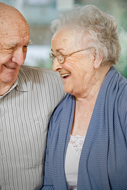 istock Elderly Couple in Nursing Home Smiling 528415173