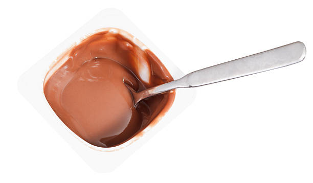 istock chocolate yogurt and spoon in disposable cup 528415315