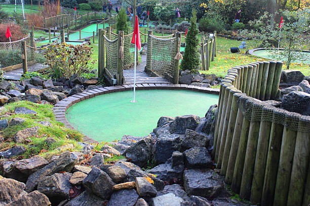 istock Image of miniature golf course (crazy golf), putting greens / flags 528415551