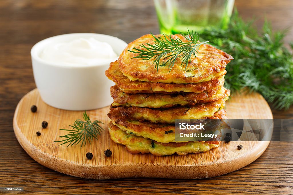 Vegetable fritters of zucchini. Vegetable fritters of zucchini.Vegetable fritters of zucchini. Zucchini Stock Photo