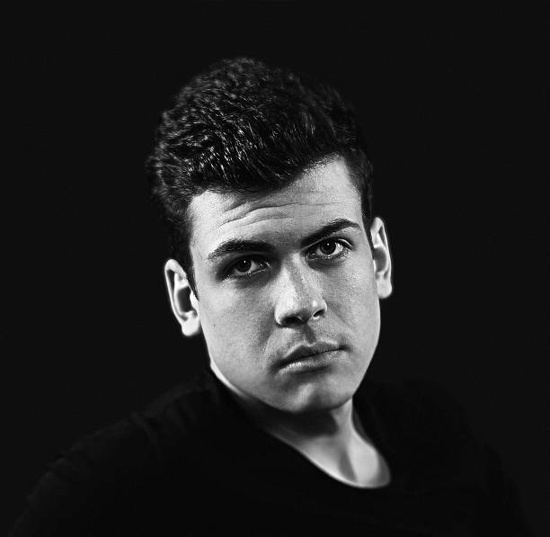 istock stylish bw young man portrait 528420710