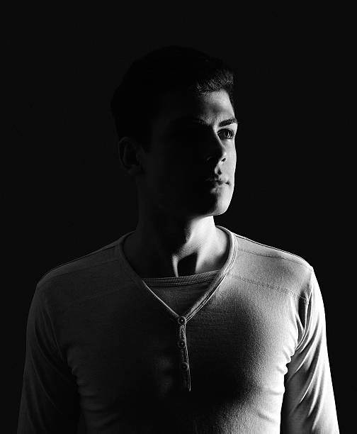 istock stylish young man portrait in low-key 528420732