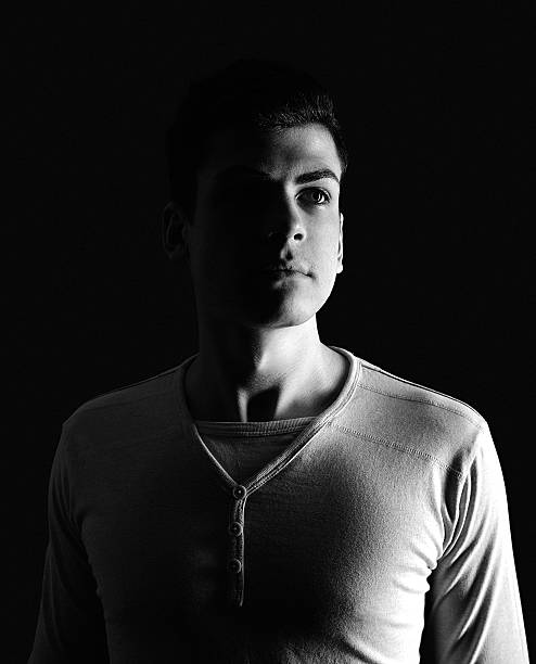 istock stylish young man portrait in low-key 528420780