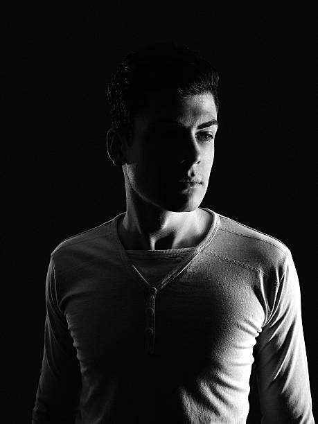 istock stylish young man portrait in low-key 528420814