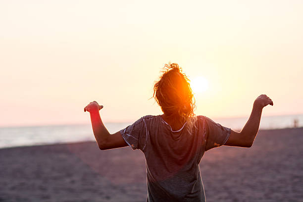 istock Hippie man at the beach 528421796