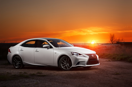 Saratov, Russia - May 08, 2014: Lexus IS250 car standing on road at sunset