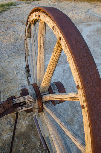 Old wagon wheels decay slowly in the Mojave Desert. Inyo County, California.