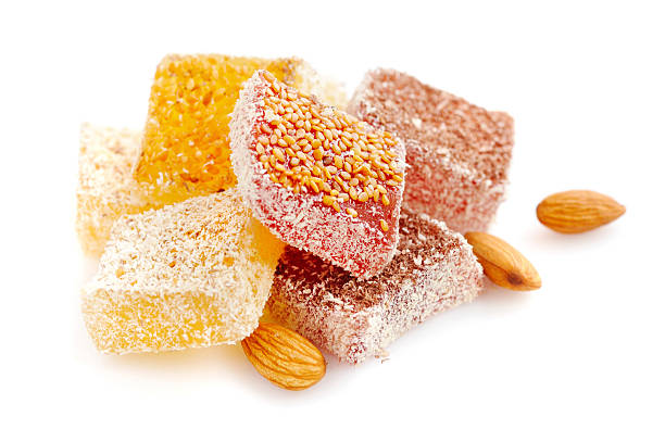 istock Tasty Turkish delight with almond isolated on white background 528423266