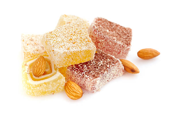 istock Tasty Turkish delight with almond isolated on white background 528423272
