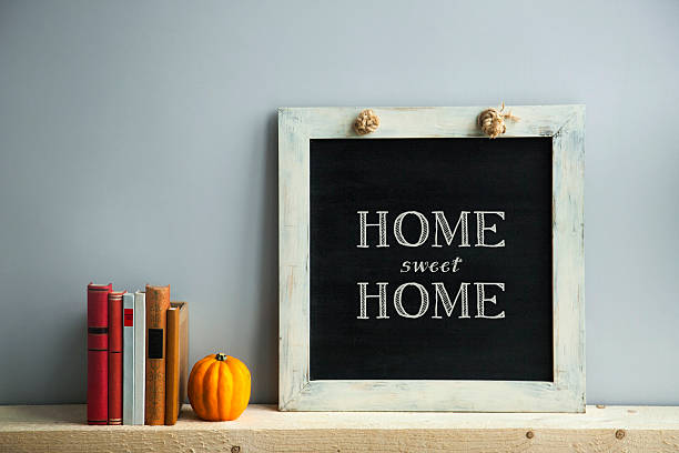 istock chalkboard frame with books  HOME SWEET HOME 528423417