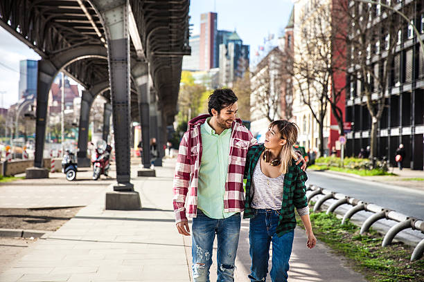 istock Couple having fun walking in the city 528423508