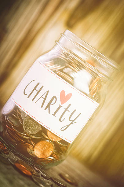 istock Charity Savings Jar 528424515