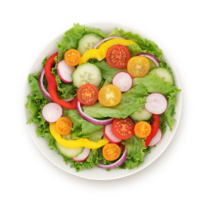 Garden vegetables salad with cherry tomatos, bell peppers, cucumber, radish and red onion -  isolated on white (excluding the shadow)