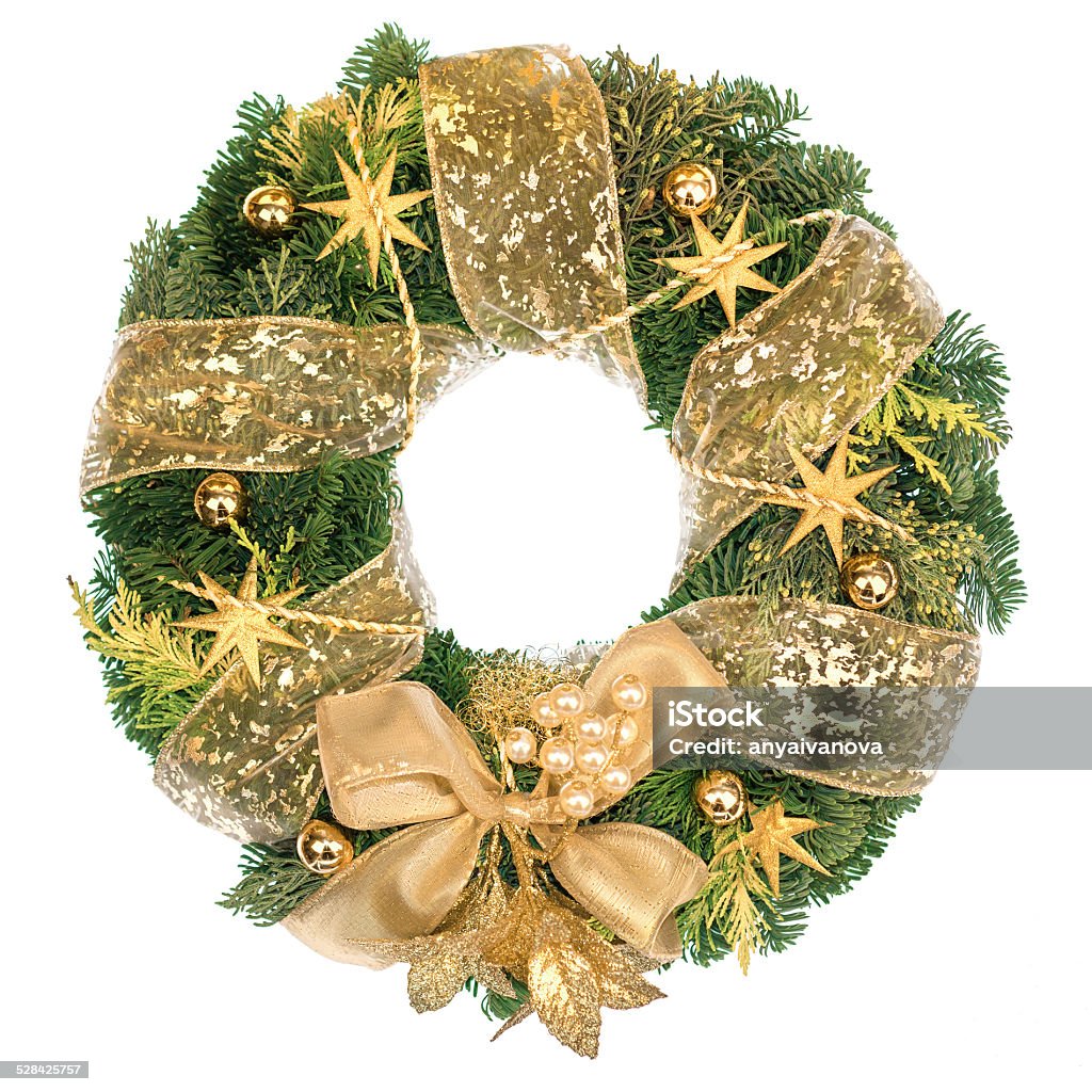 Christmas wreath with golden decorations on white background Christmas wreath with golden decorations isolated on white Berry Stock Photo