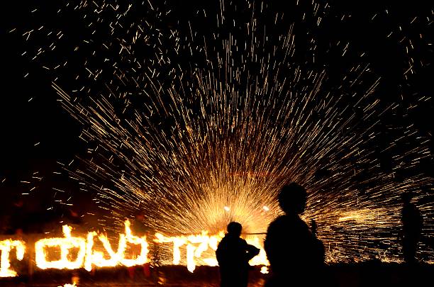 Sparks into the night sky at chanuka holiday