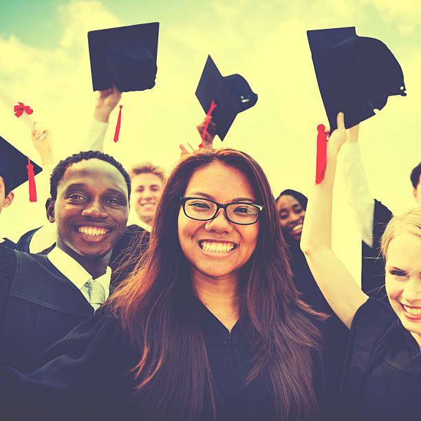 istock Group of Diverse Students Celebrating Graduation Concept 528426746