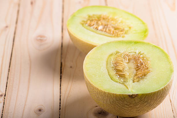 istock cantaloupe melon on the wooden table 528427450