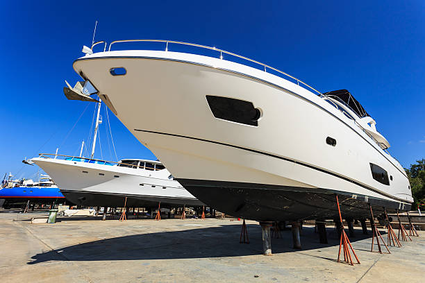 istock Luxury yacht beached for annual service and repair 528428901