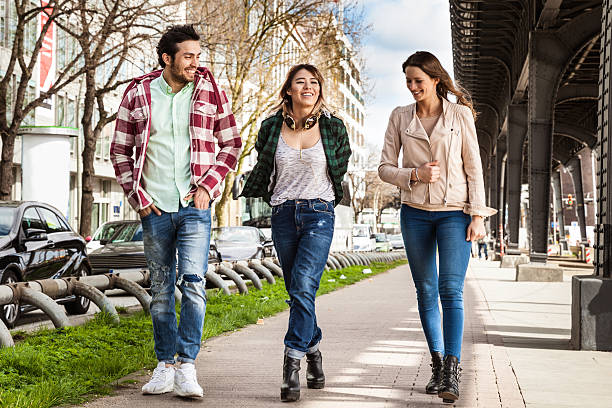 istock Friends having fun walking in the city 528428970