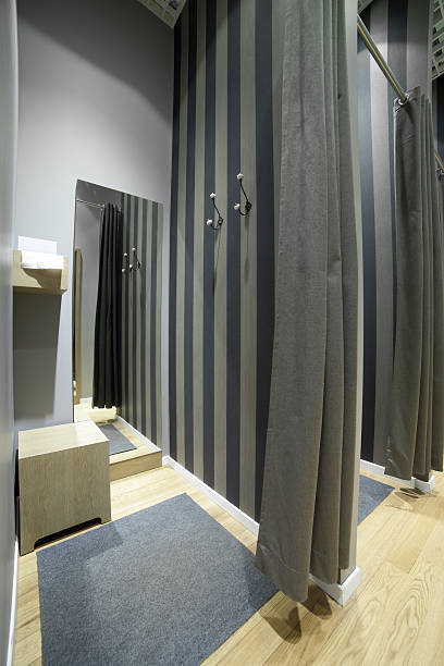istock interior of dressing room at cloth store 528429523