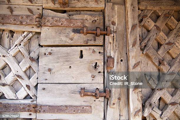 600 Years Old Wooden Doors With Metal Frame Work Stock Photo - Download Image Now - Aging Process, Ancient, Animal Markings