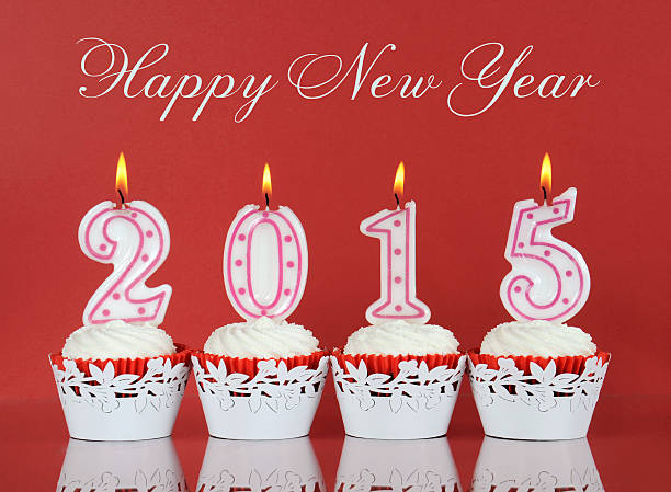 istock Happy New Year for 2015 red velvet cupcakes 528429729