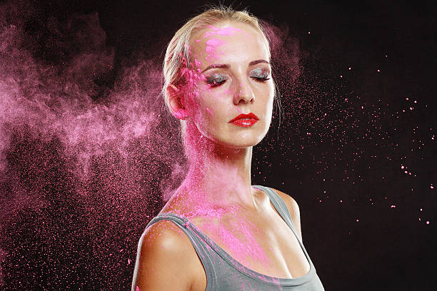 istock girl with colored powder 528429897