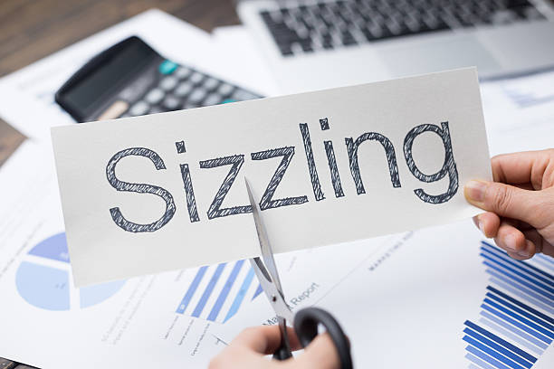 istock holds card with text on financial report and calculator 528431486