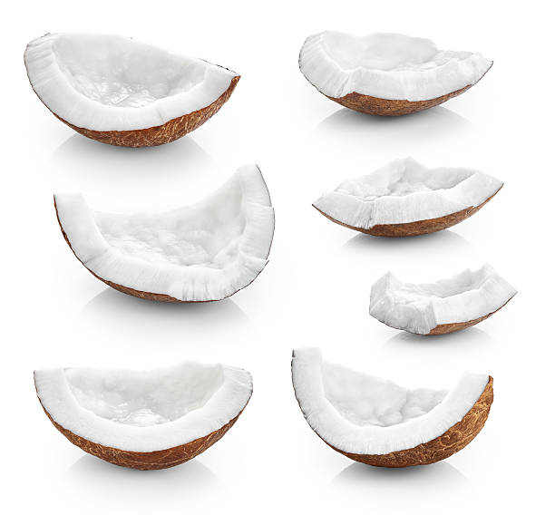 istock Coconut pieces isolated on a white background. 528434776