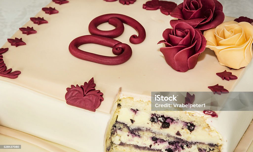 Big cake for 60th birthday, symbolic food Big tasty cake for 60th birthday. Symbolic food. Holiday theme. Birthday time. Jubilee theme. 60th Birthday Stock Photo