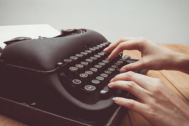 istock Vintage tone of Hands writing on old typewriter 528438652
