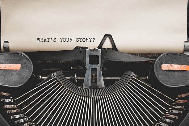 istock What's Your Story? question printed on an old typewriter. 528438888
