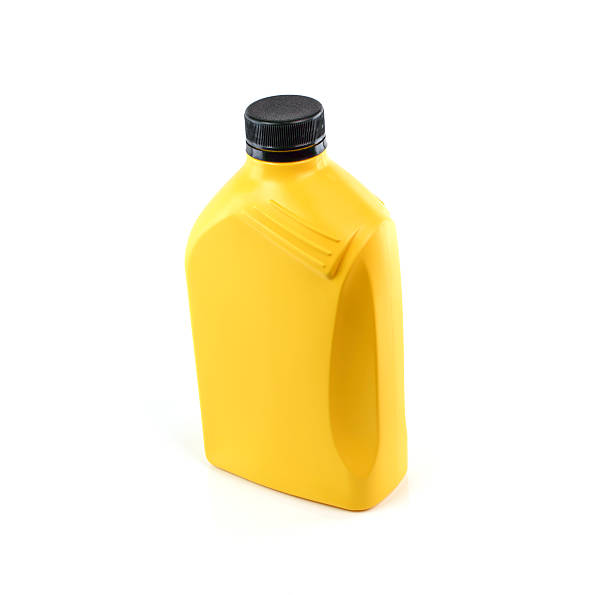 istock Lubricants , Motor oil bottle isolated on white background 528439079